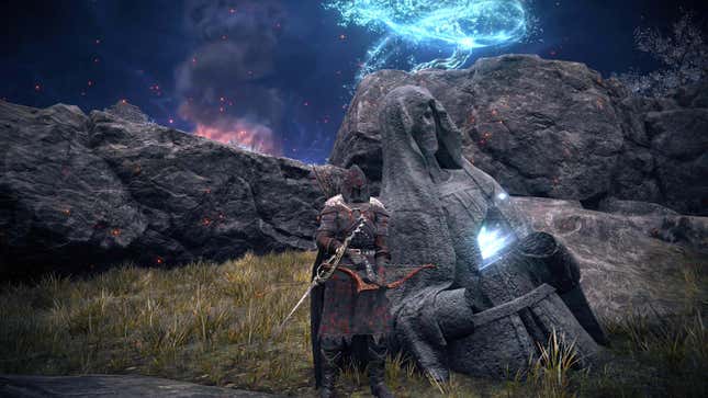 A player character stands next to a statue that has energy emitting from its chest.