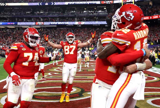 Mecole Hardman Jr. #12 of the Kansas City Chiefs celebrates with Patrick Mahomes #15 and teammates after catching the game-winning touchdown pass to defeat the San Francisco 49ers 25-22 during Super Bowl LVIII at Allegiant Stadium on February 11, 2024 in Las Vegas, Nevada.