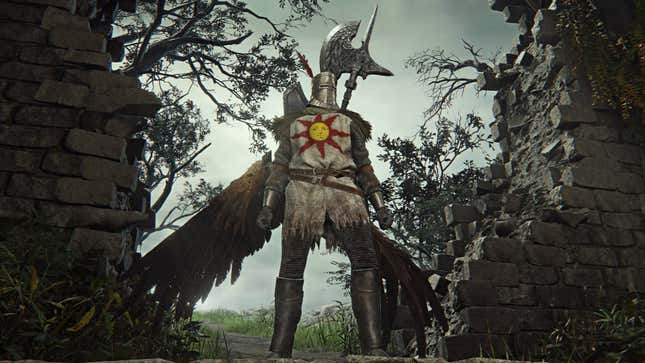 A knight stands in a massive hole in a wall.