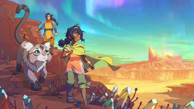 Pavi, Jae, and a feline companion look over a desert.