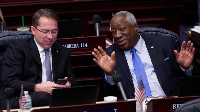 Florida Representatives Jason Shoaf, left, and Webster Barnaby chat during a break in a legislative session, Friday, April 30, 2021, at the Capitol in Tallahassee, Fla. 