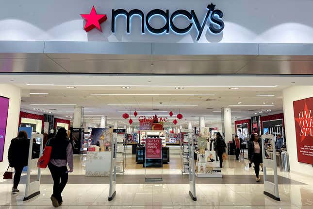 FILE - Shoppers enter a Macy&#39;s department store in Bay Shore, Long Island, New York, Dec. 12, 2023. Arkhouse Management and Brigade Capital Management announced Sunday, March 3, 2024, that they are upping their offer to acquire Macy&#39;s in a deal now valued at $6.6 billion. (AP Photo/Ted Shaffrey, File)