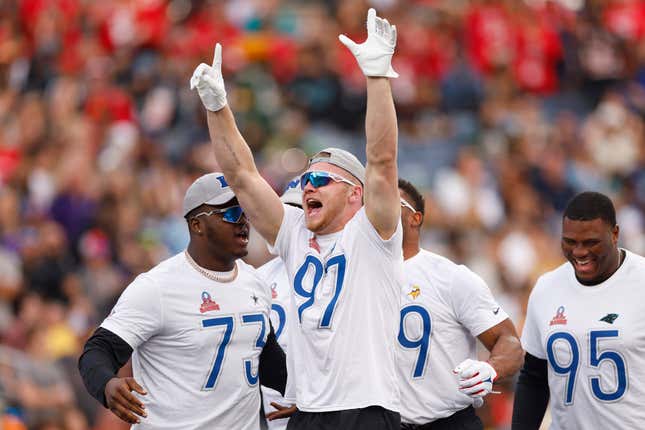 ORLANDO, FLORIDA - FEBRUARY 04: Aidan Hutchinson #97 of the Detroit Lions and NFC celebrates with teammates after winning a tug-of-war challenge during the 2024 NFL Pro Bowl Games at Camping World Stadium on February 04, 2024 in Orlando, Florida. (Photo by Mike Ehrmann/Getty Images)
