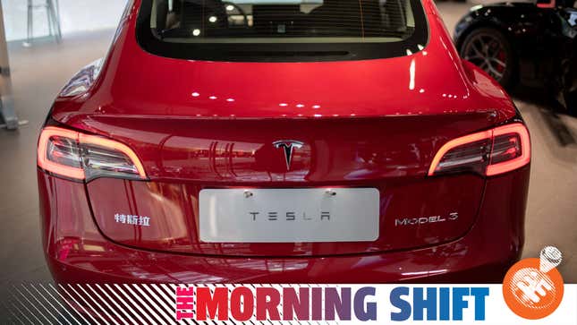 The back of a Tesla car Model 3 is seen at a Tesla shop inside of a shopping Mall in Beijing