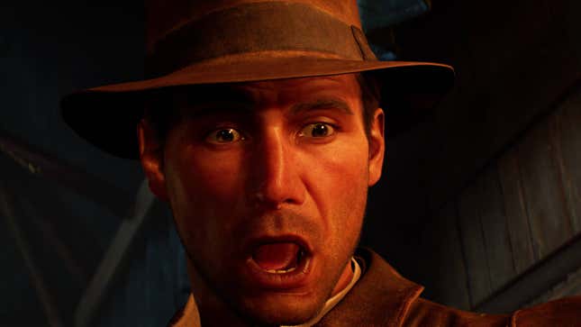 Indiana Jones in his trademark hat looks absolutely horrified, his mouth open, his eyes wide.