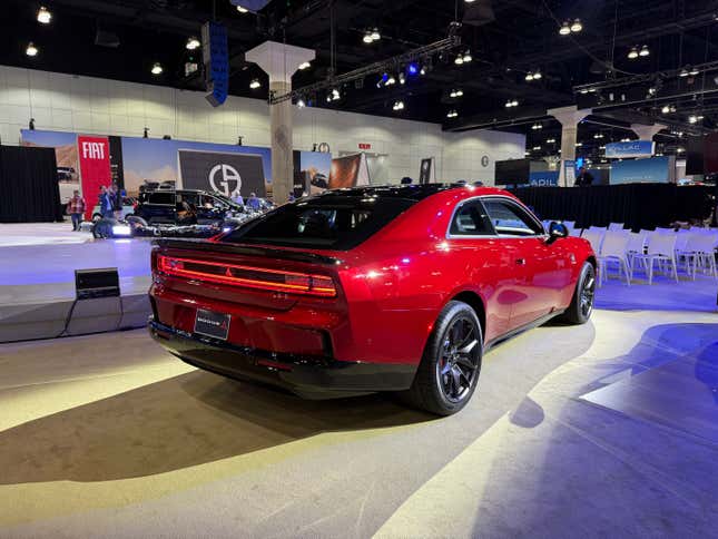 Rear 3/4 view of a red 2024 Dodge Charger Daytona EV