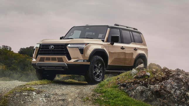 A Lexus GV climbing a rocky hill.