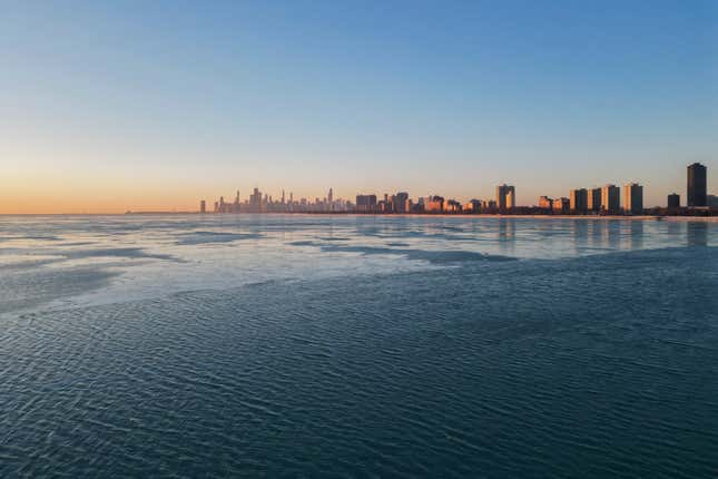 A layer of ice covers Lake Michigan, Thursday, Feb. 2, 2023, in Chicago. (AP Photo/Erin Hooley)