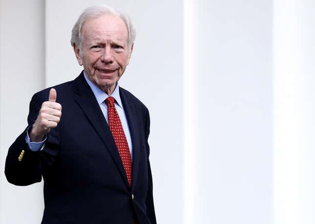 A picture of the recently passed former US senator, Joe Lieberman, giving a thumbs up.