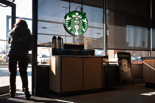 A customer exits a Starbucks in Chicago, Illinois.