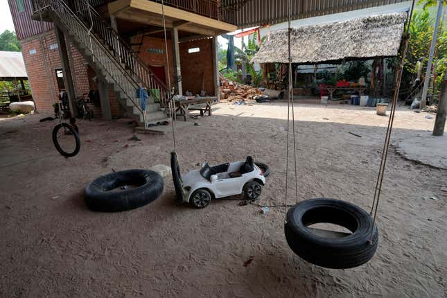 Swings made from tire hang in the house of palm sugar farmer Chin Choeun at Trapang Ampel village, outside Phnom Penh, Cambodia, Friday, March 15, 2024. (AP Photo/Heng Sinith)