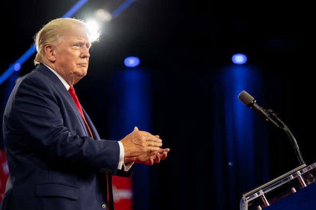 Former U.S. President Donald Trump applauds upon arrival at the Conservative Political Action Conference (CPAC) at the Hilton Anatole on August 06, 2022, in Dallas, Texas. 