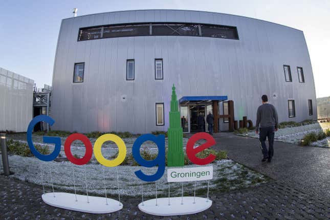 photo of Google Groningen logo outside of a grey office building with a few windows