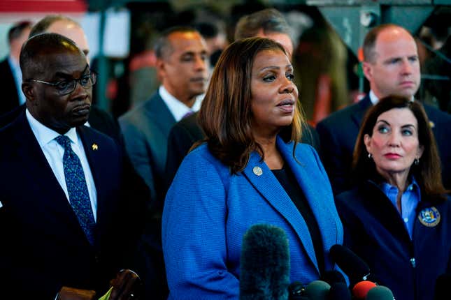 New York Attorney General Letitia James, center, accompanied by Buffalo Mayor Byron Brown, left, New York Gov. Kathy Hochul, right, and other officials, speaks with members of the media during a news conference near the scene of a shooting at a supermarket, in Buffalo, N.Y., Sunday, May 15, 2022. 