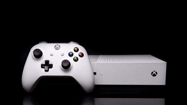 an xbox one s against a black background