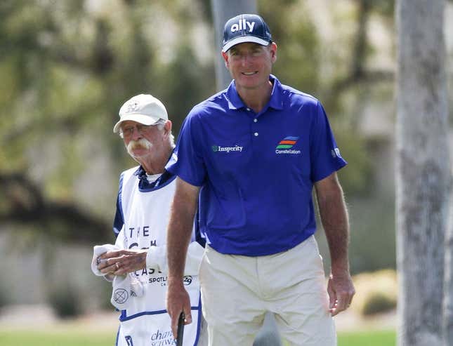 Jim Furyk, right, and his caddie Mike &#39;Fluff&#39; Cowan study the green on the 18th hole during the pro-am at the Galleri Classic at Mission Hills Country Club in Rancho Mirage, Calif., March 27, 2024.