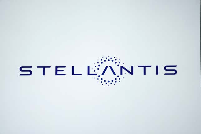 FILE - The Stellantis logo is shown at the North American International Auto Show, Sept. 13, 2023, in Detroit. On Monday, Nov. 13, Stellantis said that it will offer buyout or early retirement packages to about 6,400 nonunion U.S. salaried employees as the auto industry faces what the company is calling challenging market conditions. (AP Photo/Paul Sancya, File)