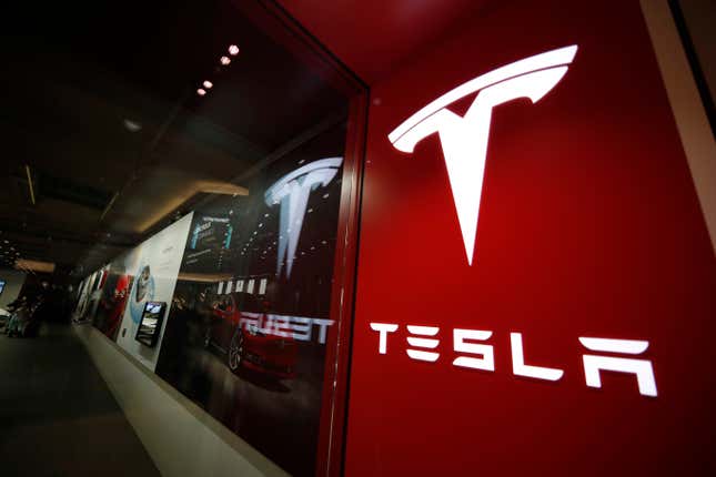 FILE - The Tesla logo is displayed at the company&#39;s store in Cherry Creek Mall, Feb. 9, 2019, in Denver. Tesla&#39;s stock tumbled below $150 per share Thursday, April 18, 2024, giving up all of the gains made over the past year as the electric vehicle maker reels from falling sales and steep discounts intended to lure more buyers. (AP Photo/David Zalubowski, File)