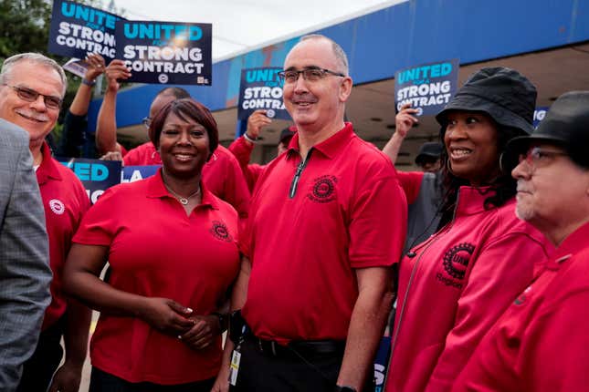 UAW members at a rally amid a push for a strike authorization.