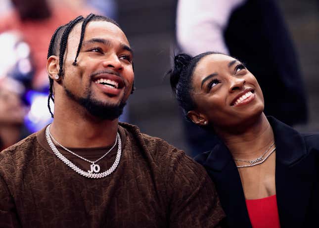 HOUSTON, TEXAS - JANUARY 29: Simone Biles and Jonathan Owens attend a game between the Houston Rockets and the Los Angeles Lakers at Toyota Center on January 29, 2024 in Houston, Texas. 