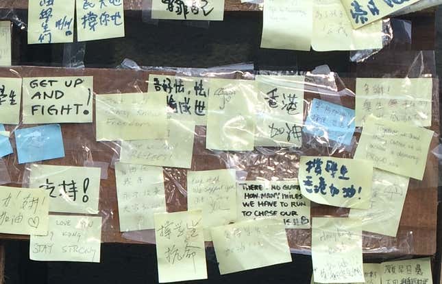 The post-it note in the middle in black ink says, “Don’t be timid.”