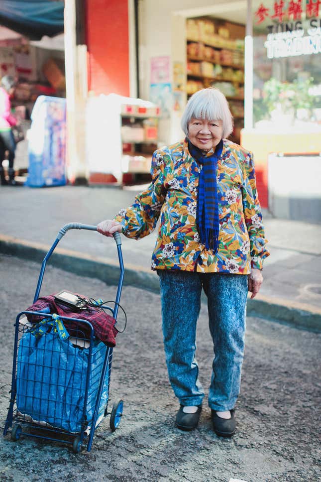 Shi Ping Tay, 81, wearing four different prints (one is tucked beneath her jacket).