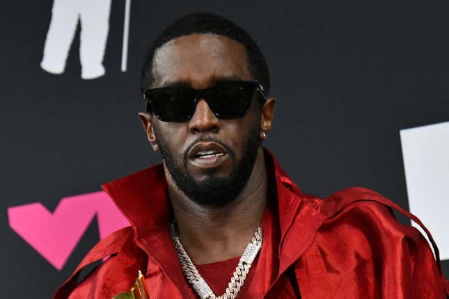 Sean “Diddy” Combs poses with the Global Icon award at the MTV Video Music Awards in Newark, New Jersey, on September 12, 2023.
