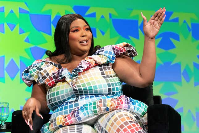 Grammy-winning singer, rapper, songwriter and flutist Lizzo appears on stage during the keynote session ‘Lizzo’ at the 2022 SXSW Conference and Festival at the Austin Convention Center in Austin, Texas, on March 13, 2022. (Photo by SUZANNE CORDEIRO / AFP) (Photo by SUZANNE CORDEIRO/AFP via Getty Images)