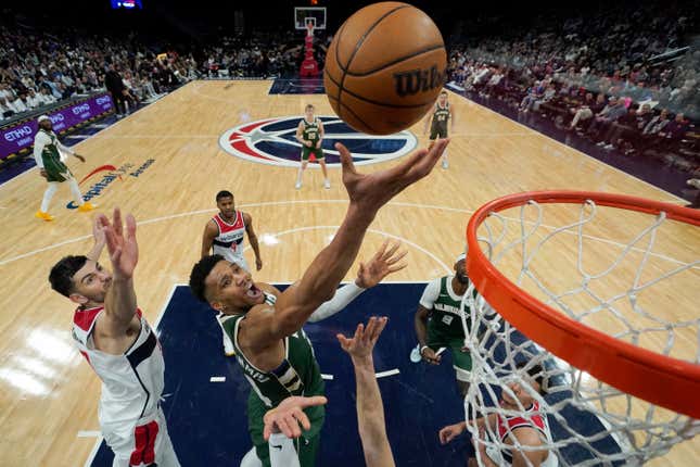 WASHINGTON, DC - APRIL 02: Giannis Antetokounmpo #34 of the Milwaukee Bucks goes up for a shot against Tristan Vukcevic #00 of the Washington Wizards during the second half at Capital One Arena on April 02, 2024 in Washington, DC. NOTE TO USER: User expressly acknowledges and agrees that, by downloading and or using this photograph, User is consenting to the terms and conditions of the Getty Images License Agreement. (Photo by Jess Rapfogel/Getty Images)