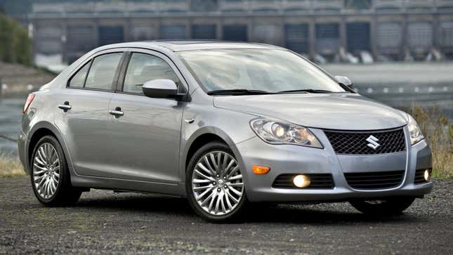 A silver Suzuki Kizashi.