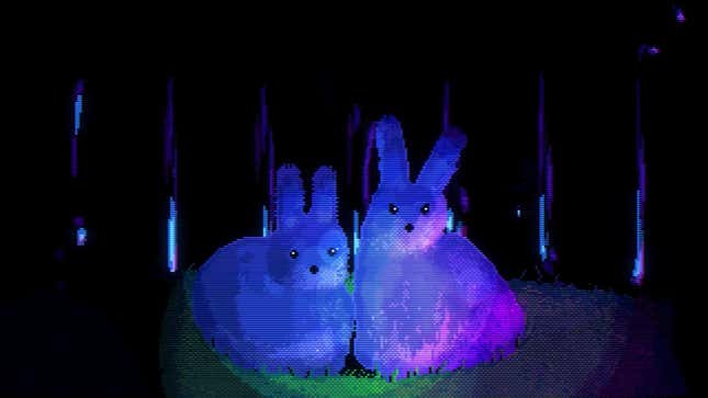 Two bunnies sit side by side.