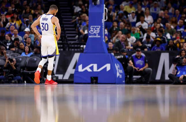 ORLANDO, FLORIDA - MARCH 27: Stephen Curry #30 of the Golden State Warriors looks on during a game against the Orlando Magic at Kia Center on March 27, 2024 in Orlando, Florida. NOTE TO USER: User expressly acknowledges and agrees that, by downloading and or using this photograph, User is consenting to the terms and conditions of the Getty Images License Agreement. (Photo by Mike Ehrmann/Getty Images)