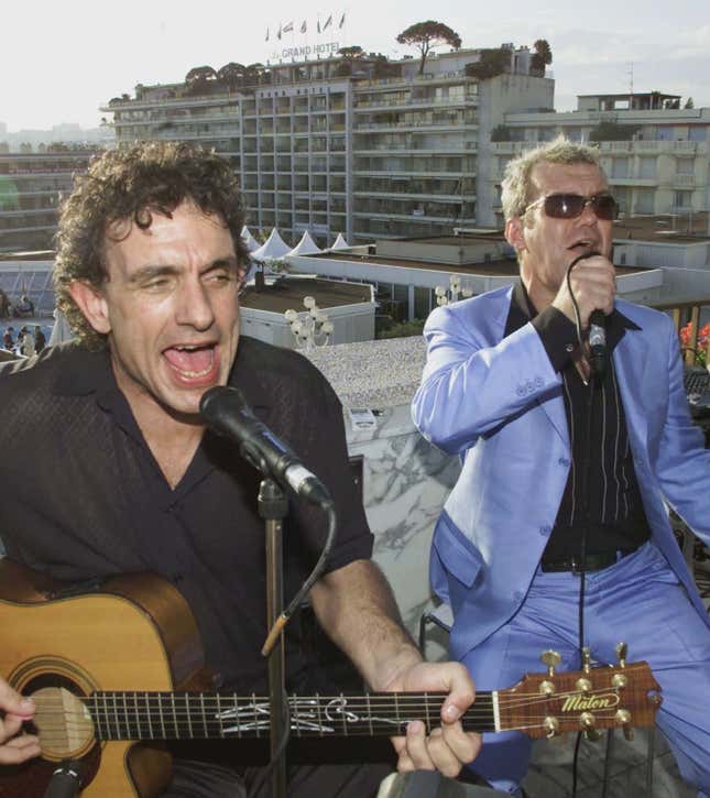 Jimmy Barnes, right, performs with Cold Chisel bandmate Ian Moss at the International Film Festival in Cannes, France, in 2001.