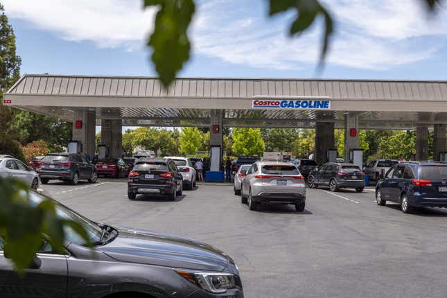 Customers line up at a Costco gas station in Concord, California, U.S., on Wednesday, June 22, 2022.