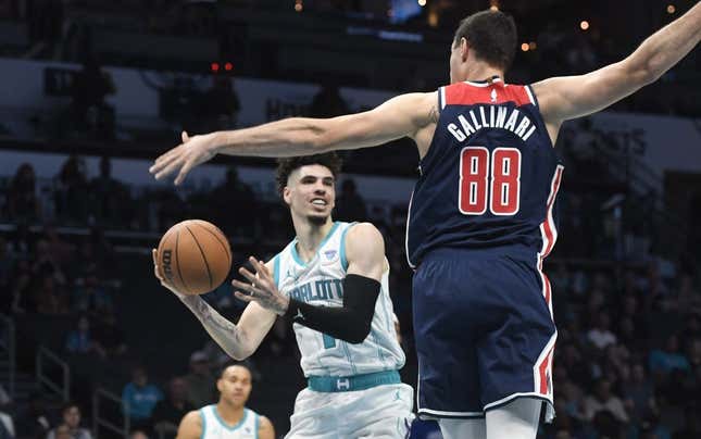 Nov 8, 2023; Charlotte, North Carolina, USA; Charlotte Hornets guard LaMelo Ball (1) looks to pass as he is defended by Washington Wizards Danilo Gallinari (88) during the first half at the Spectrum Center.