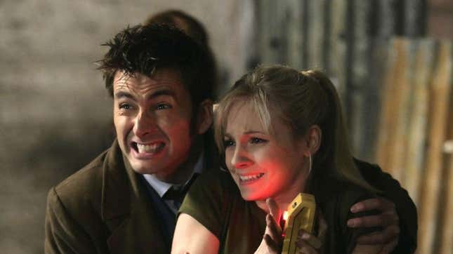 David Tennant's Doctor grits his teeth and holds his daughter (played by Georgia Tennant) in Doctor Who.