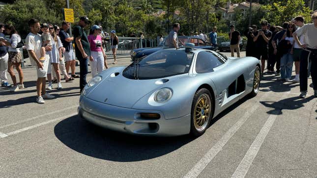 A light blue Isdera Commendatore 112i 