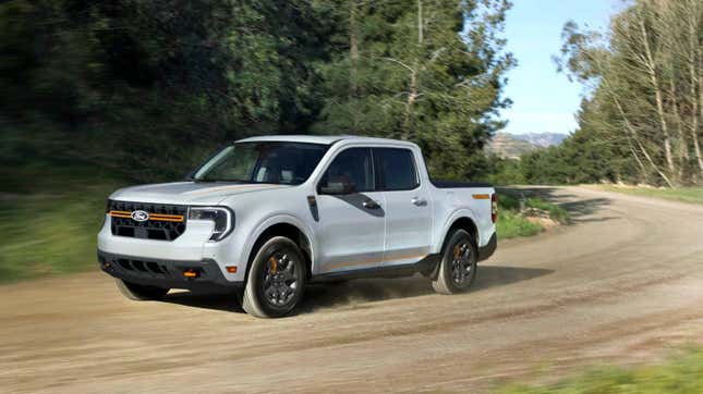 a white ford maverick driving on a dirt road