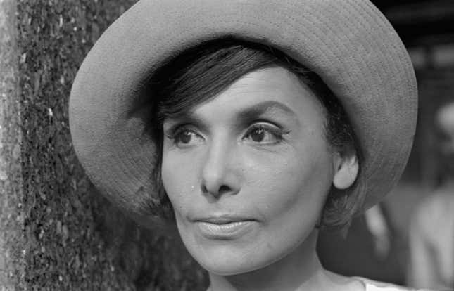 Outdoor portrait of singer Lena Horne, wearing a hat, September 9th 1964.