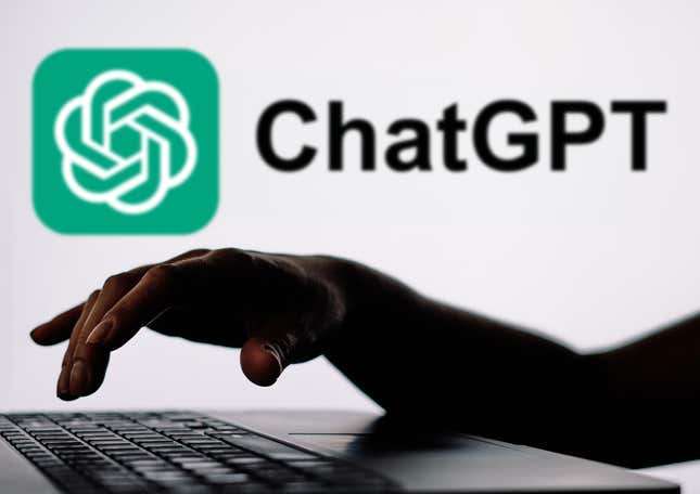 The ChatGPT logo is seen in the background and a silhouette of a person using a computer.
