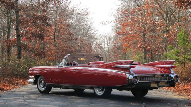 A photo of a red convertible Cadillac Eldorado.