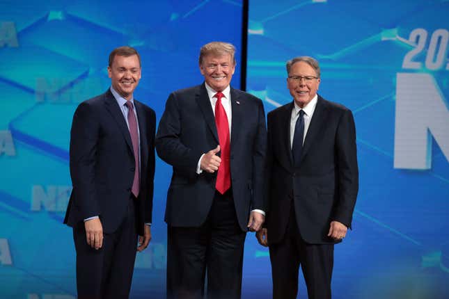 President Donald Trump with NRA Executive Vice President Wayne LaPierre, right, and Executive Director NRA-ILA Chris Cox, left, at the 148th NRA Annual Meetings &amp; Exhibits on April 26, 2019, in Indianapolis.