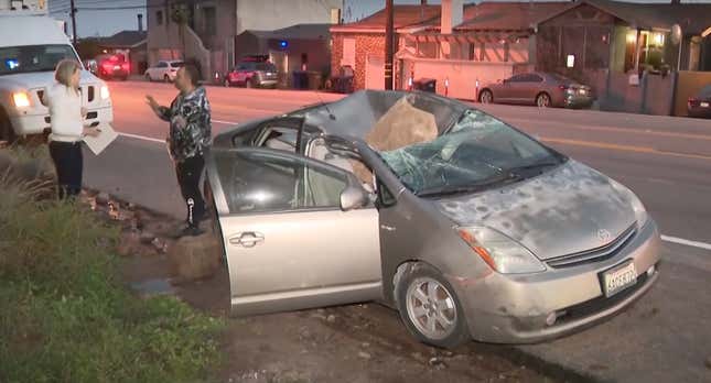 Image for article titled Man Barely Escapes Death When Four-Foot Boulder Lands on His Car