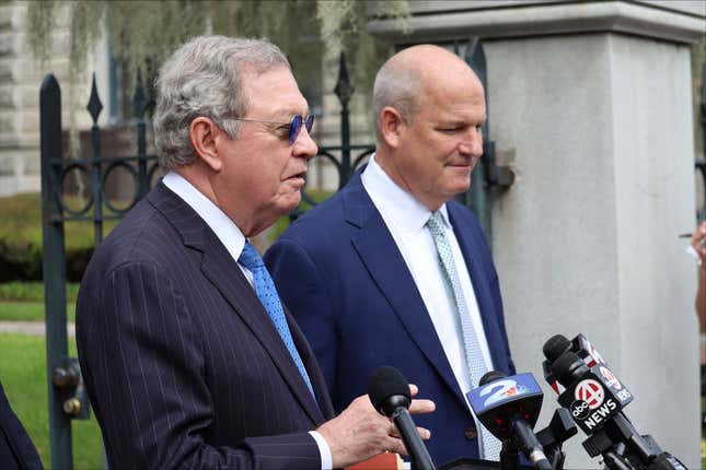 Defense attorneys for Alex Murdaugh, Dick Harpootlian, left, and Jim Griffin, right, speak with reporters outside the federal courthouse in Charleston, S.C. on Thursday, Sept. 21, 2023. Murdaugh has pleaded guilty in federal court to financial crimes. Thursday’s court appearance is the first time the disbarred attorney has admitted responsibility for a crime before a judge.(AP Photo/James Pollard)