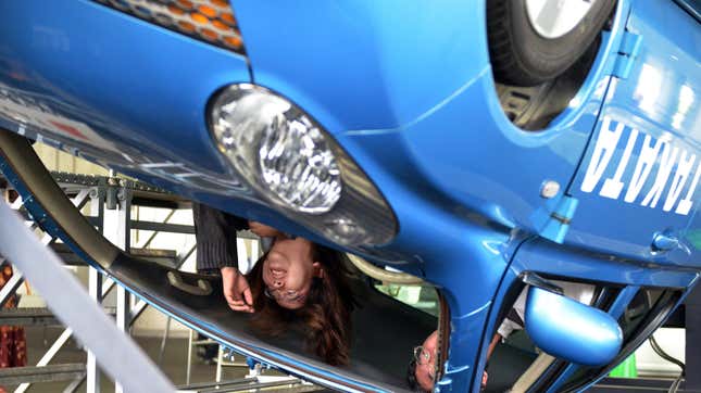 Takata demonstrates the effectiveness of its seatbelts during a 2012 exhibition.