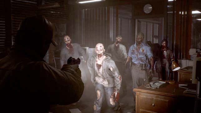 A The Day Before survivor aims their flashlight and pistol at a small horde of zombies lumbering towards them in what looks like an office building.