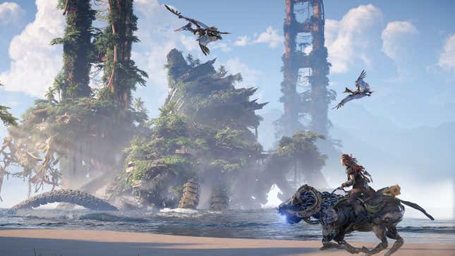 Aloy rides a robot dinosaur alongside a post-apocalyptic San Francisco beach in Horizon Forbidden West