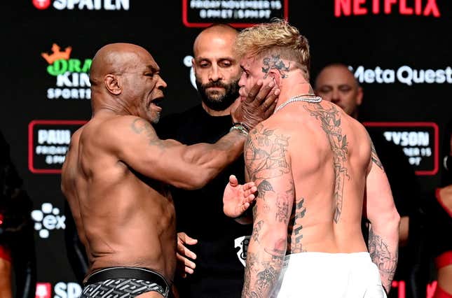 Mike Tyson, left, and Jake Paul face off during weigh-ins, held at Toyota Music Factory in Irving, Texas, USA, ahead of their heavyweight bout, on November 15th at AT&amp;T Stadium in Arlington, Texas