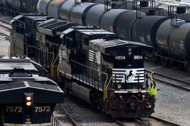 FILE - Norfolk Southern locomotives are moved through the Conway Terminal in Conway, Pa., June 17, 2023. Norfolk Southern wants its shareholders to back its current management team and strategy and reject a bid from a group of investors to take over the railroad. Norfolk Southern urged shareholders Monday, Feb. 26, 2024 to reject Ancora Holdings eight board nominees when it filed its proxy statement. (AP Photo/Gene J. Puskar, file)