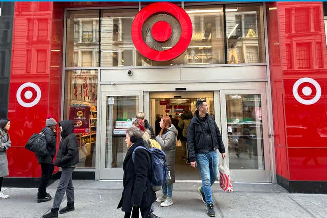 Shoppers walk from a Target store in midtown Manhattan in New York on Tuesday, March 19, 2024. On Tuesday, March 26, 2024, the Conference Board issues its latest monthly report on U.S. consumer confidence, which captures public responses on issues ranging from purchasing plans to the direction of inflation. (AP Photo/Ted Shaffrey)